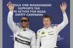 Foto zur News: Lewis Hamilton (Mercedes) und Kimi Räikkönen (Lotus)