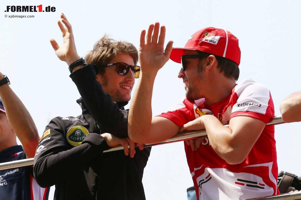 Foto zur News: Romain Grosjean (Lotus) und Fernando Alonso (Ferrari)