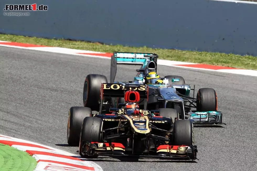 Foto zur News: Nico Rosberg (Mercedes) und Kimi Räikkönen (Lotus)