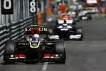 Foto zur News: Romain Grosjean (Lotus) und Valtteri Bottas (Williams)