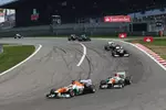 Foto zur News: Paul di Resta (Force India) und Adrian Sutil (Force India) im teaminternen Zweikampf