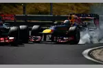 Foto zur News: Sebastian Vettel (Red Bull) und Jenson Button (McLaren)