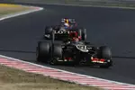 Foto zur News: Kimi Räikkönen (Lotus) und Sebastian Vettel (Red Bull)