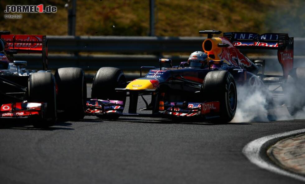Foto zur News: Sebastian Vettel (Red Bull) und Jenson Button (McLaren)