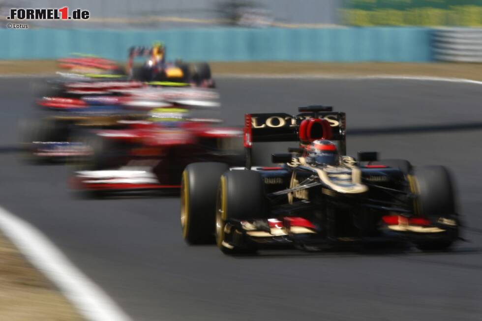 Foto zur News: Kimi Räikkönen (Lotus) und Felipe Massa (Ferrari)