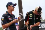 Foto zur News: Sebastian Vettel (Red Bull) und Kimi Räikkönen (Lotus)