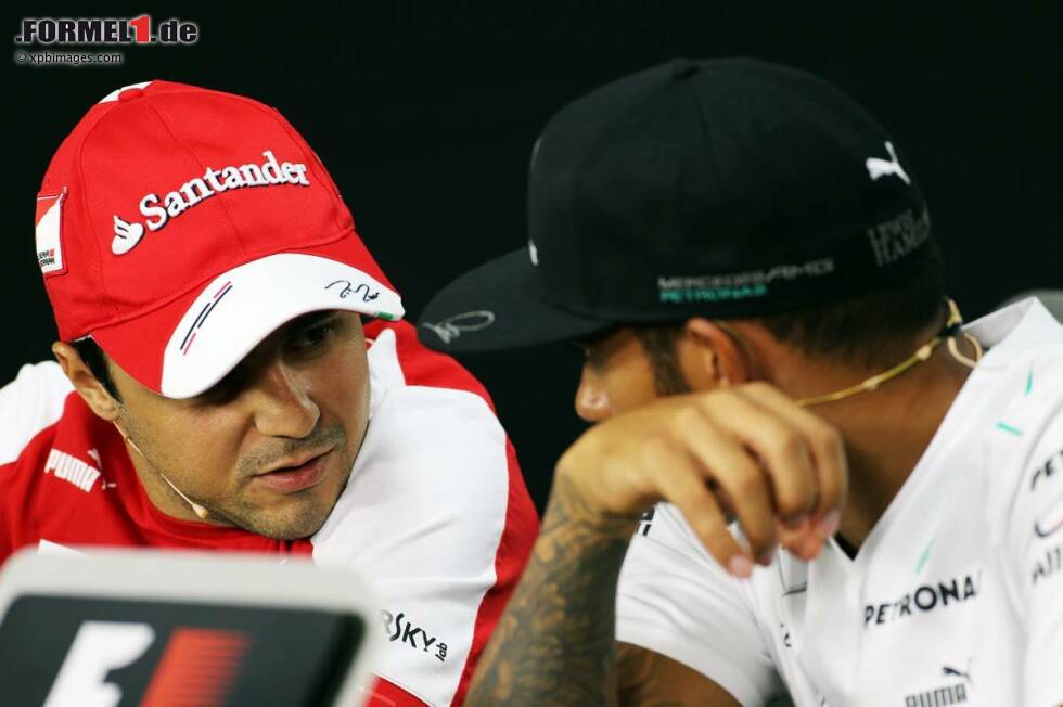 Foto zur News: Felipe Massa (Ferrari) und Lewis Hamilton (Mercedes)