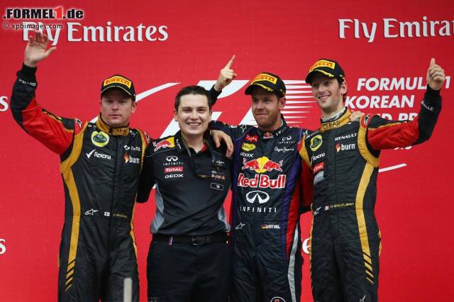 Foto zur News: Die drei Besten des 14. WM-Laufs: Sieger Sebastian Vettel, Kimi Räikkönen (links) und Romain Grosjean (rechts)