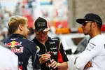 Foto zur News: Sebastian Vettel (Red Bull), Lewis Hamilton (Mercedes) und Kimi Räikkönen (Lotus)