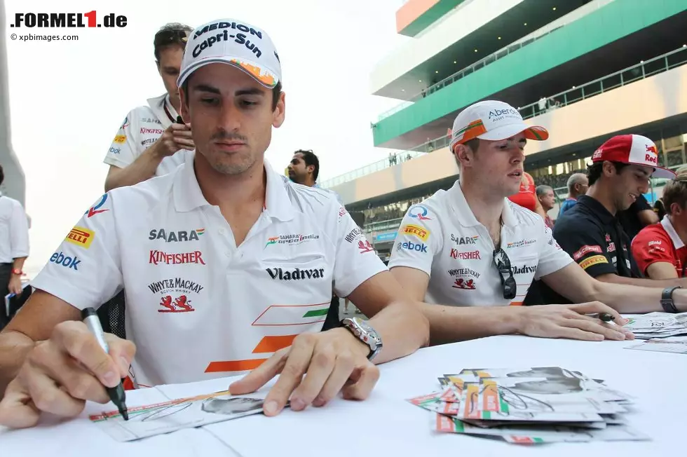 Foto zur News: Adrian Sutil (Force India) und Paul di Resta (Force India)