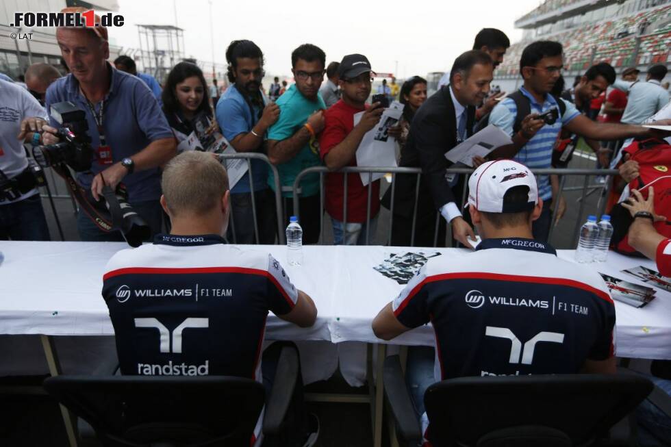 Foto zur News: Valtteri Bottas (Williams) und Pastor Maldonado (Williams)