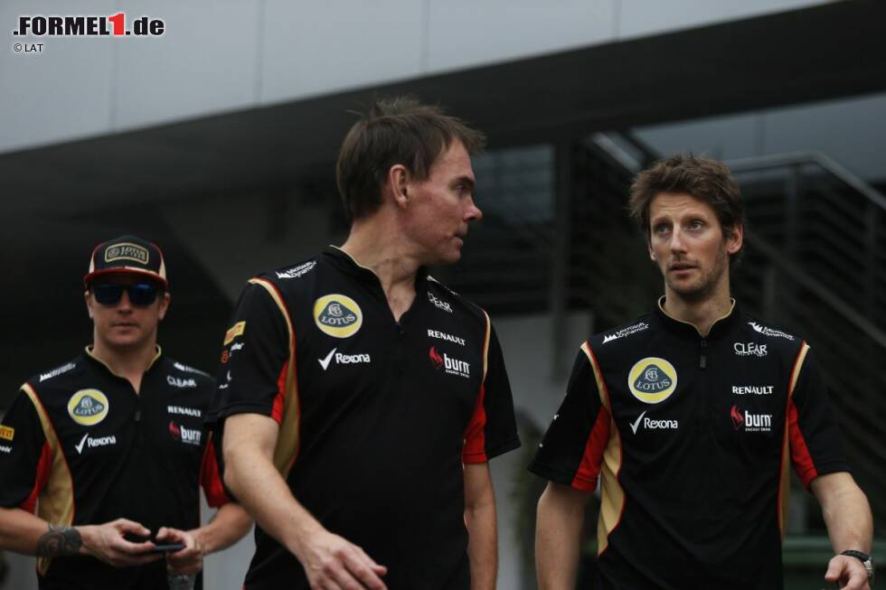 Foto zur News: Kimi Räikkönen (Lotus) und Romain Grosjean (Lotus)