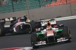 Foto zur News: Adrian Sutil (Force India) und Esteban Gutierrez (Sauber)