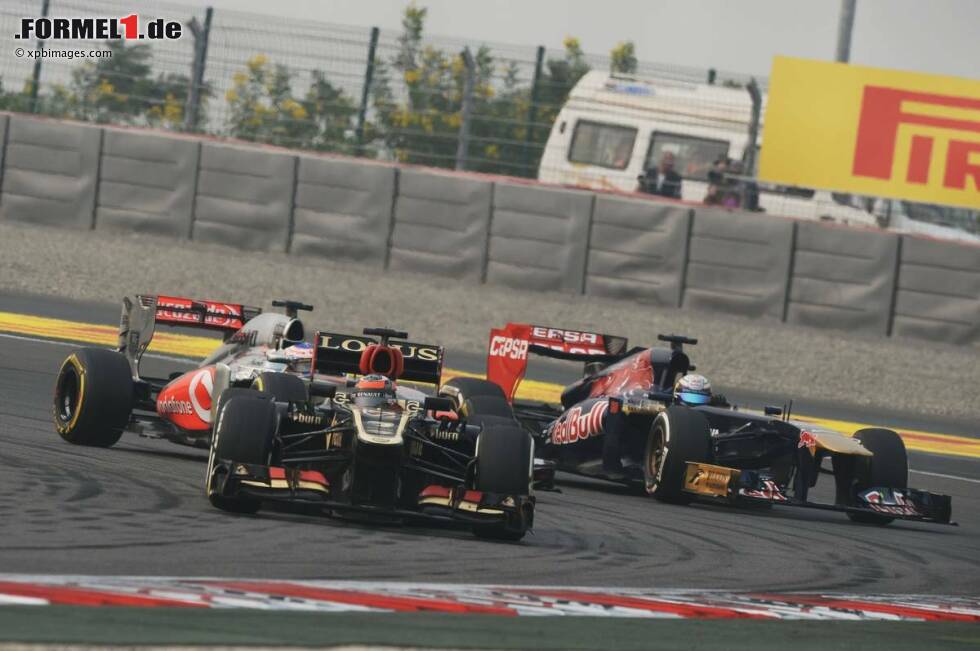 Foto zur News: Jenson Button (McLaren), Jean-Eric Vergne (Toro Rosso) und Kimi Räikkönen (Lotus)