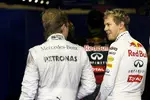 Foto zur News: Sebastian Vettel (Red Bull) und Nico Rosberg (Mercedes)