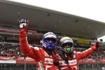 Foto zur News: Felipe Massa und Marc Gene (Ferrari)