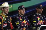 Foto zur News: Romain Grosjean (Lotus), Sebastian Vettel (Red Bull) und Mark Webber (Red Bull)