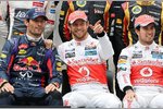 Foto zur News: Mark Webber (Red Bull) und Jenson Button (McLaren)