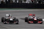 Foto zur News: Nico Hülkenberg (Sauber) und Jenson Button (McLaren)