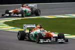 Foto zur News: Adrian Sutil (Force India) und Paul di Resta (Force India)