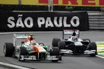 Foto zur News: Adrian Sutil (Force India) und Valtteri Bottas (Williams)