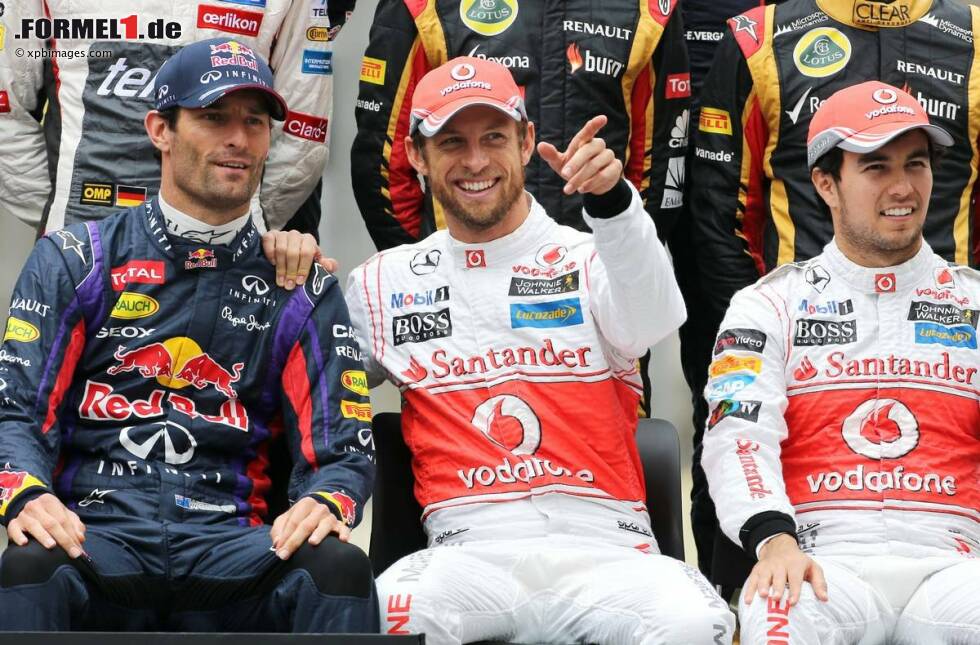 Foto zur News: Mark Webber (Red Bull) und Jenson Button (McLaren)
