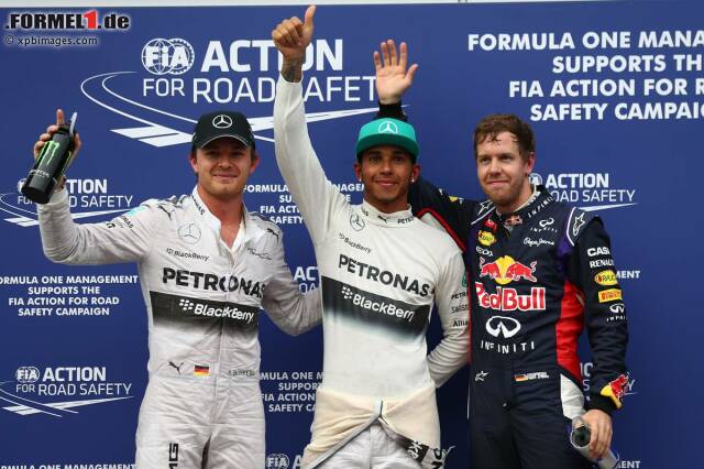 Foto zur News: Zwei Deutsche gesellten sich zum Briten: Teamkollege Nico Rosberg auf dem dritten und Sebastian Vettel im Red Bull auf dem zweiten Rang.