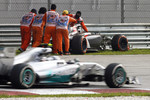 Foto zur News: Adrian Sutil (Sauber) und Nico Rosberg (Mercedes)