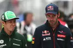 Foto zur News: Kamui Kobayashi (Caterham) und Jean-Eric Vergne (Toro Rosso)