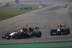 Foto zur News: Nico Hülkenberg (Force India) und Romain Grosjean (Lotus)