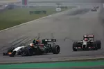 Foto zur News: Nico Hülkenberg (Force India) und Romain Grosjean (Lotus)