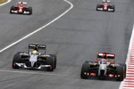Foto zur News: Romain Grosjean (Lotus) und Esteban Gutierrez (Sauber)