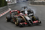 Foto zur News: Romain Grosjean (Lotus) und Adrian Sutil (Sauber)