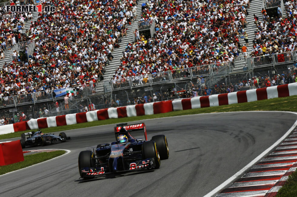 Foto zur News: Jean-Eric Vergne (Toro Rosso) und Jenson Button (McLaren)