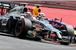 Foto zur News: Kevin Magnussen (McLaren) und Daniel Ricciardo (Red Bull)