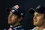 Foto zur News: Nico Rosberg (Mercedes) und Sebastian Vettel (Red Bull)