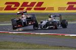 Foto zur News: Esteban Gutierrez (Sauber) rammt Pastor Maldonado (Lotus)