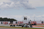 Foto zur News: Nico Rosberg (Mercedes), Jenson Button (McLaren) und Kevin Magnussen (McLaren)