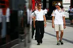 Foto zur News: Jenson Button (McLaren) und Adrian Sutil (Sauber)