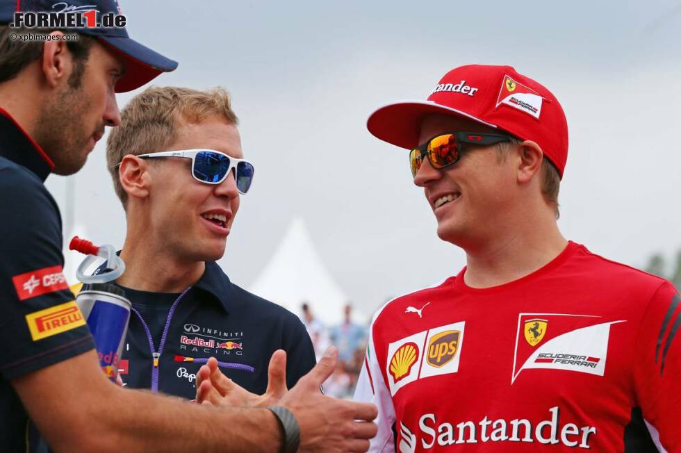 Foto zur News: Jean-Eric Vergne (Toro Rosso), Sebastian Vettel (Red Bull) und Kimi Räikkönen (Ferrari)