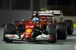 Foto zur News: Fernando Alonso (Ferrari) und Kimi Räikkönen (Ferrari)