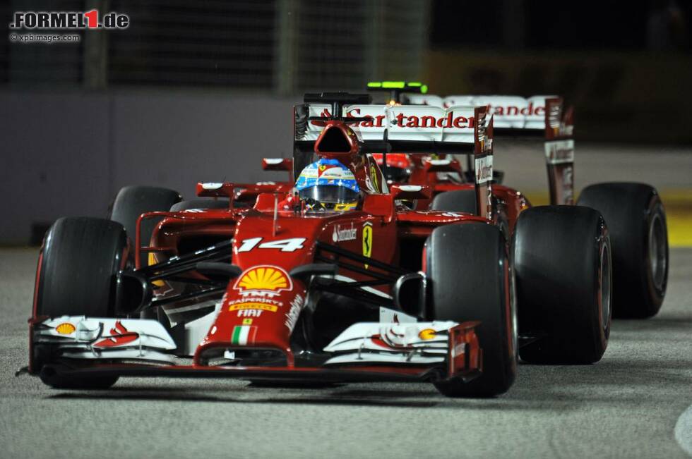 Foto zur News: Fernando Alonso (Ferrari) und Kimi Räikkönen (Ferrari)