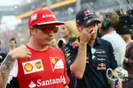 Foto zur News: Sebastian Vettel (Red Bull) und Kimi Räikkönen (Ferrari)