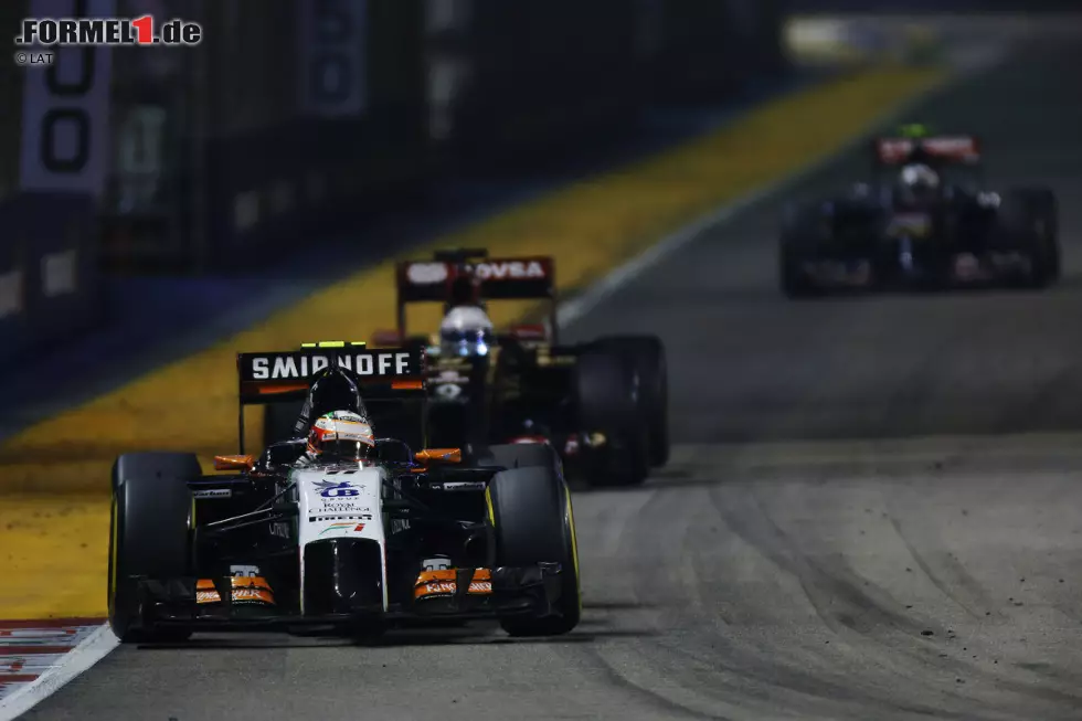 Foto zur News: Sergio Perez (Force India) und Romain Grosjean (Lotus)