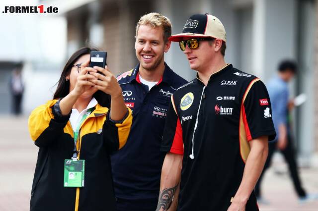 Foto zur News: Sebastian Vettel und Kimi Räikkönen