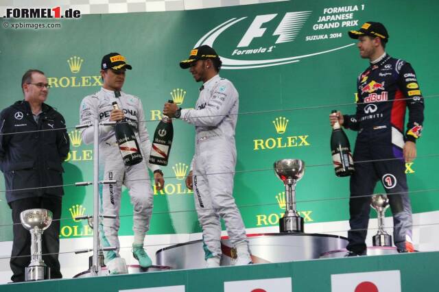 Foto zur News: Verhaltene Freude auf dem Podium: Sieger Hamilton und der Zweitplatzierte Rosberg