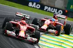 Foto zur News: Fernando Alonso (Ferrari) und Kimi Räikkönen (Ferrari)