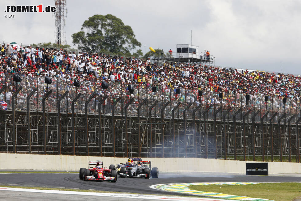 Foto zur News: Fernando Alonso (Ferrari) und Adrian Sutil (Sauber)