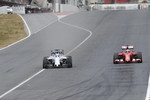 Foto zur News: Felipe Massa (Williams) und Kimi Räikkönen (Ferrari)