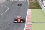 Foto zur News: Kimi Räikkönen (Ferrari) und Romain Grosjean (Lotus)